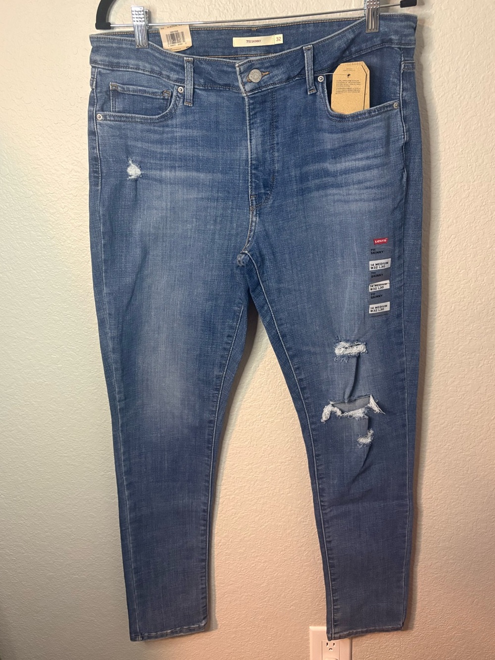 Levi's 711 Skinny Jeans - Faded Blue with Red Logo